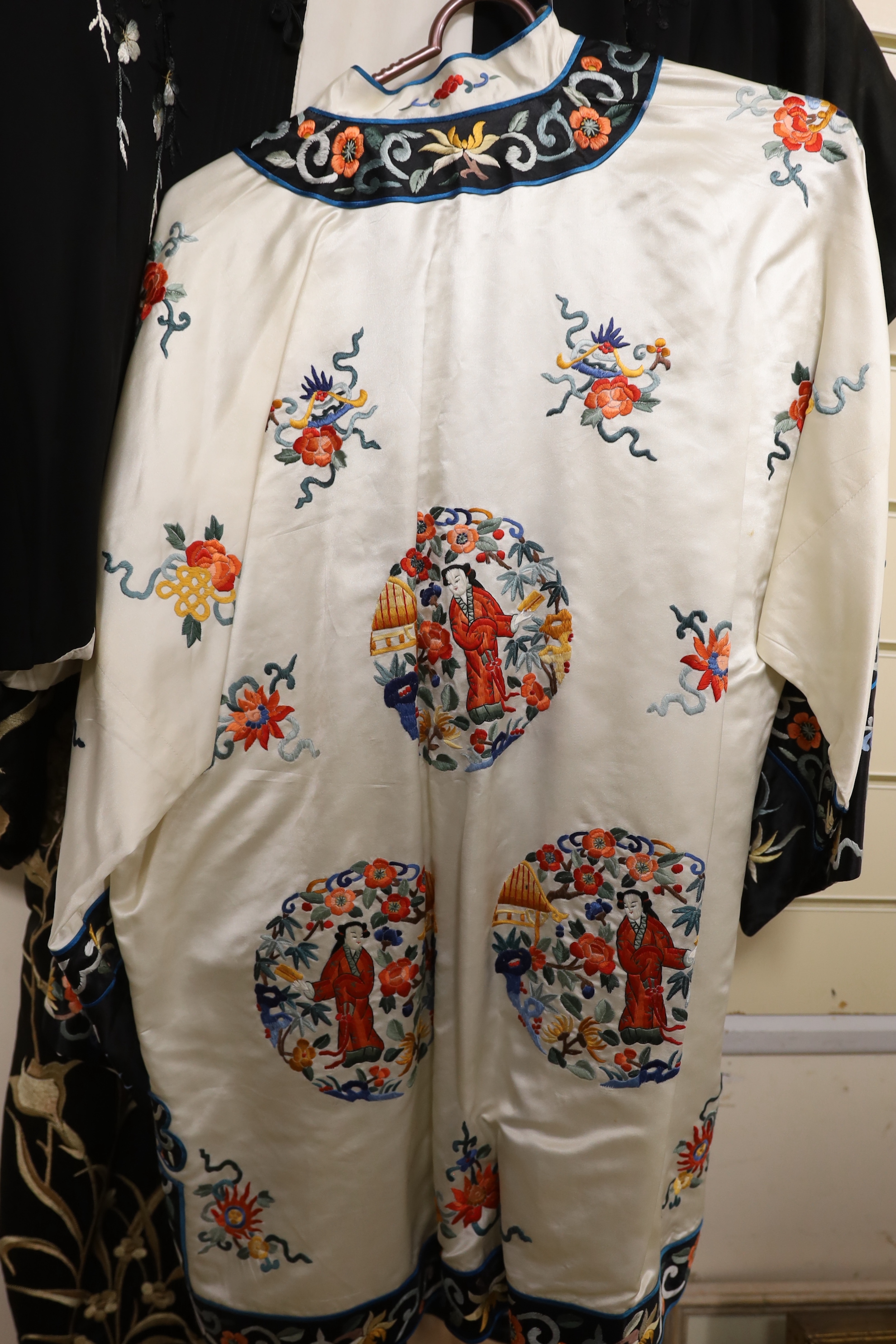 A silk embroidered kimono, a Chinese embroidered jacket and a Japanese embroidered jacket